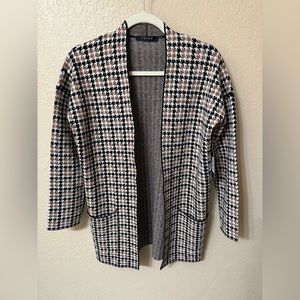 Cyrus houndstooth sweater. Brand new.